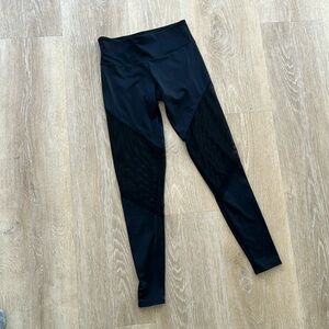 Black legging with mesh paneling on legs size small